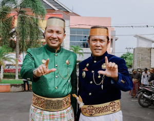 *Harmoni Pemimpin Luwu Utara: Bupati dan Wakil Bupati Kompak Hadiri Puncak HPRL di Istana Kedatuan*
